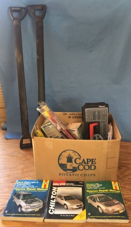 lot 105 image: Misc Auto Supplies and Manuals