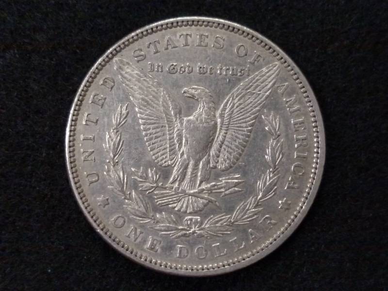 lot 6 image: 1885 Morgan Silver Dollar...