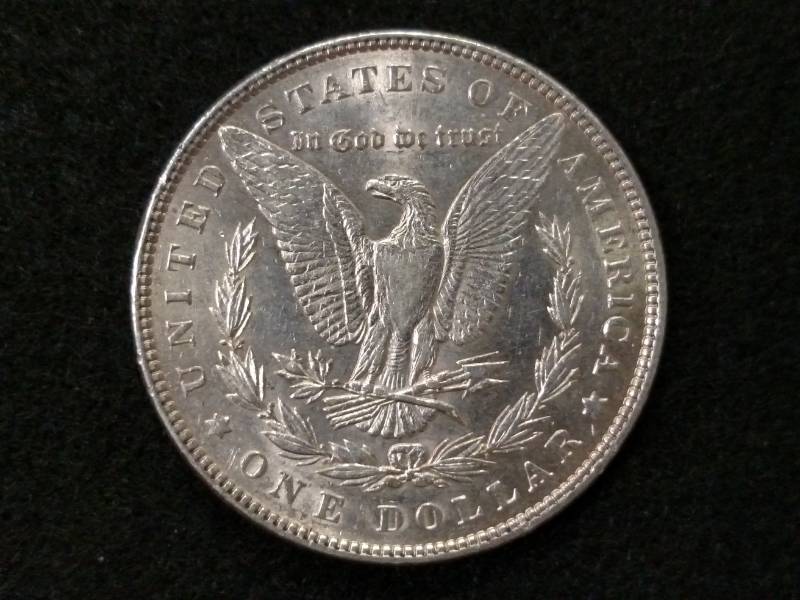 lot 8 image: 1886 AU Morgan Silver Dollar...