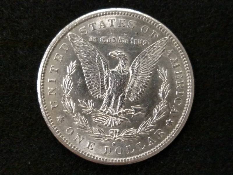 lot 9 image: 1887 S AU Morgan Silver Dollar...