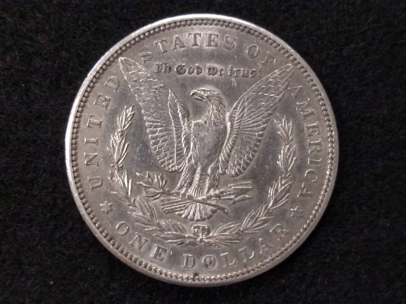 lot 11 image: 1900 Morgan Silver Dollar...