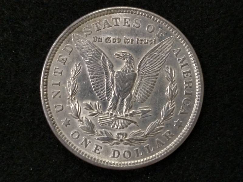 lot 15 image: 1921 Morgan Silver Dollar...