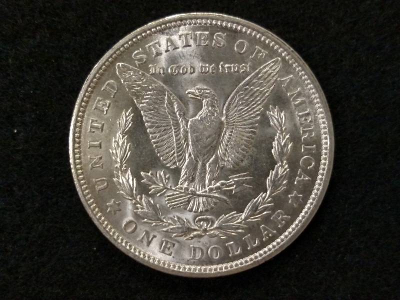 lot 23 image: 1921 D Morgan Silver Dollar...