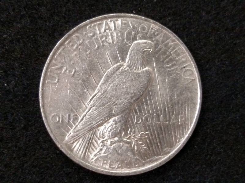 lot 28 image: 1922 Peace Silver Dollar...