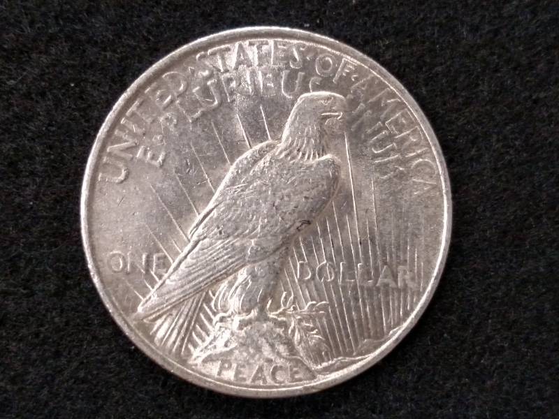 lot 31 image: 1922 Peace Silver Dollar...