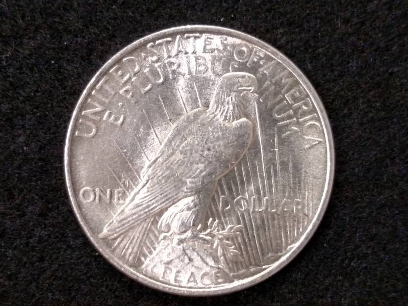 lot 32 image: 1922 Peace Silver Dollar...