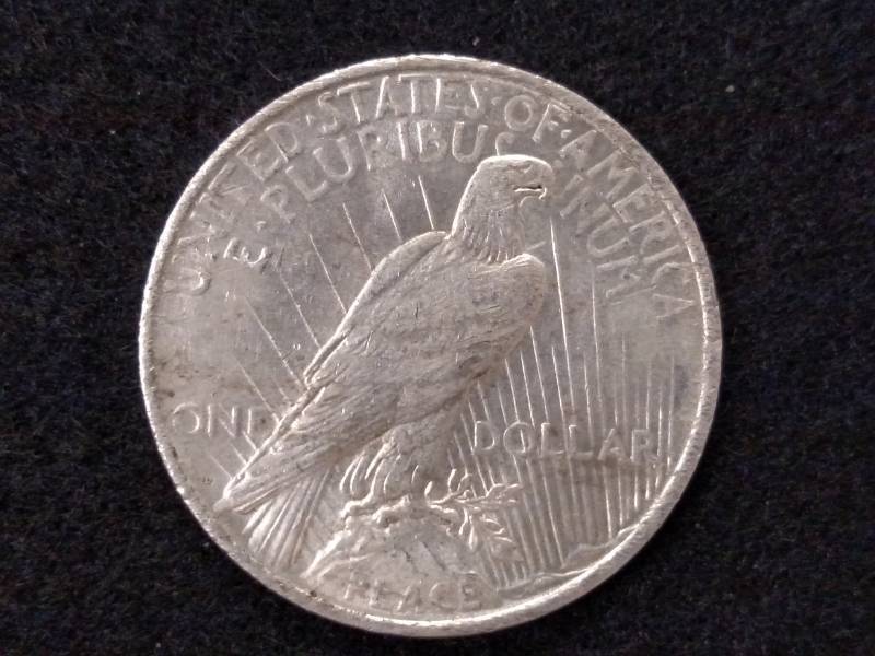 lot 34 image: 1922 D Peace Silver Dollar...