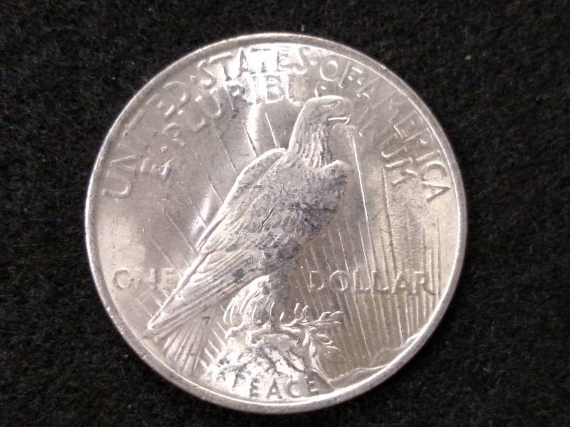 lot 40 image: 1923 Peace Silver Dollar...