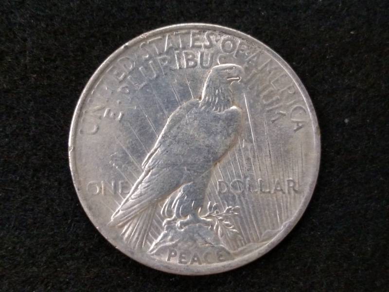 lot 42 image: 1923 Peace Silver Dollar...