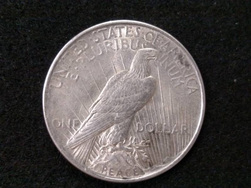 lot 49 image: 1924 Peace Silver Dollar...