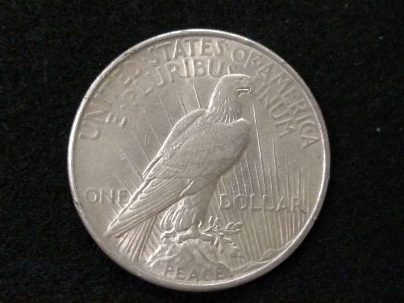 lot 50 image: 1925 Peace Silver Dollar...
