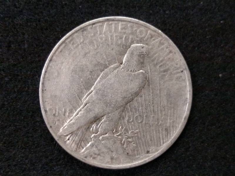 lot 54 image: 1935 S Peace Silver Dollar...