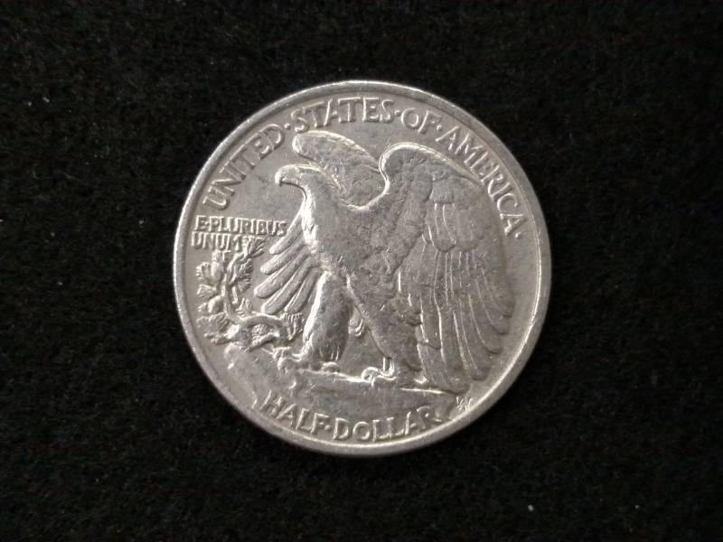 lot 77 image: 1943 Walking Liberty Silver Half Do...