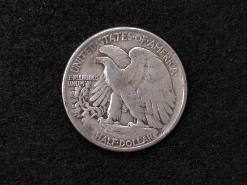 lot 82 image: 1945 Walking Liberty Silver Half Do...