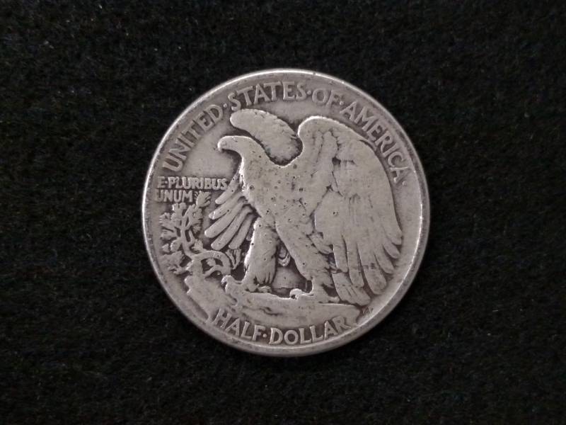 lot 83 image: 1945 Walking Liberty Silver Half Do...