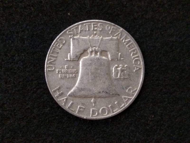 lot 101 image: 1958 D Franklin Silver Half Dollar...