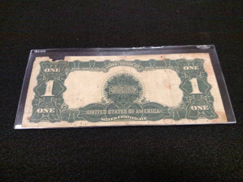 lot 133 image: 1899 Large Size Black Eagle One Dol...
