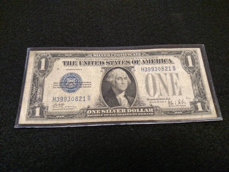 lot 139 image: 1928 B Funny Back One Dollar Silver...