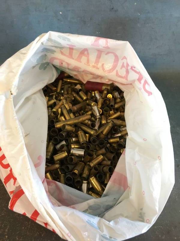 lot 15 image: Loading Brass Cartridges