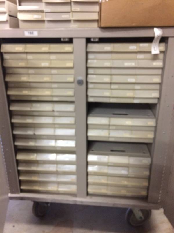 lot 72 image: WOW MSRP $3000 LIONVILLE SERIES PHARMACY TRANSFER STORAGE CABINET CART - ONE SIDE IS COMPLETE THE OTHER SIDE HAS ALL THE DRAWERS BUT MISSING TRAYS TO HOLD THEM INTO PLACE - GREAT CONDITION OTHERWISE  