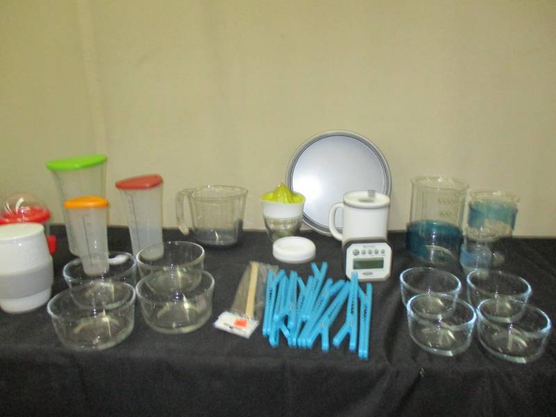 lot 16 image: Measuring Cups, Spring Pan looks unused, Measuring Containers with lids, Preperation bowls, cup, Chip Clips Juicer, timer and more