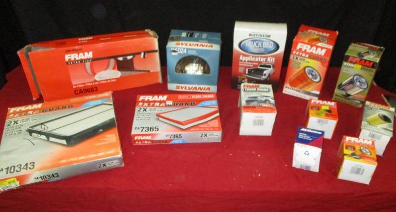lot 124 image: Variety of Automotive filters, headlight and bedliner kit
