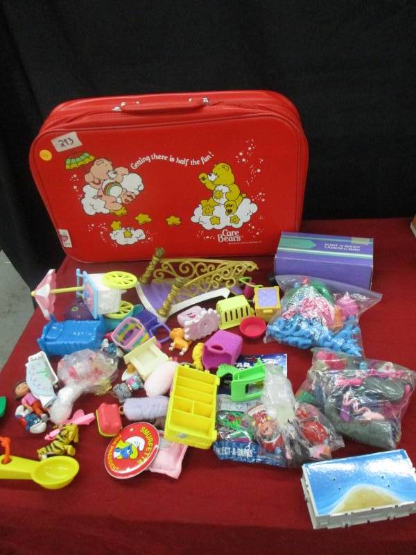 lot 169 image: Carebear Suitcase and lots of toys