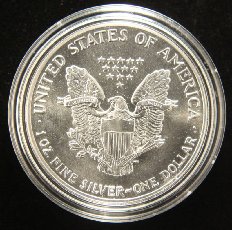 1987 AMERICAN SILVER EAGLE 1 TROY OZ. .999 FINE SILVER IN AIRTITE