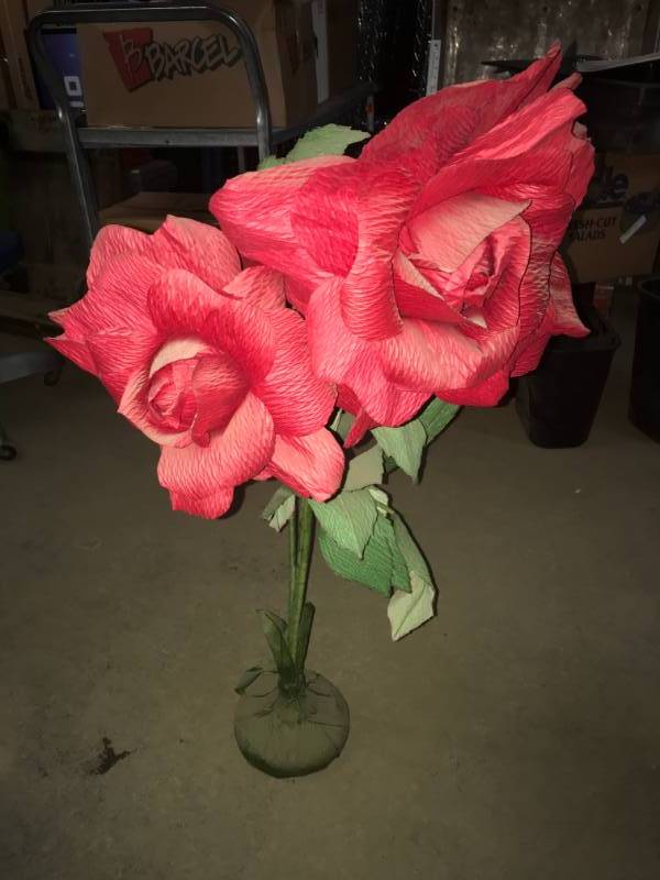 lot 2 image: Pair of red crepe paper roses