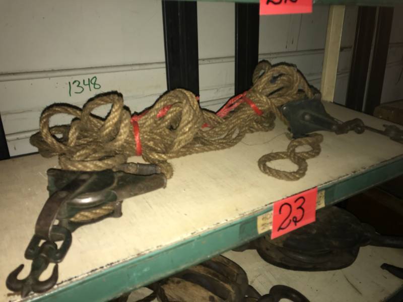 lot 23 image: Two Vintage Pulleys & Rope