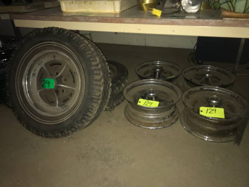 lot 129 image: Six Chrome Rims, two with tires
