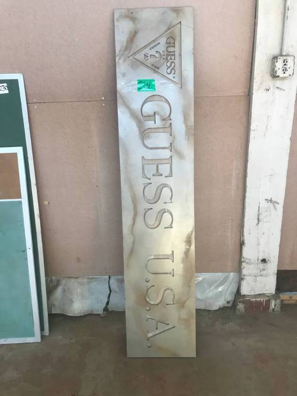 lot 231 image: Metal Sign Guess USA