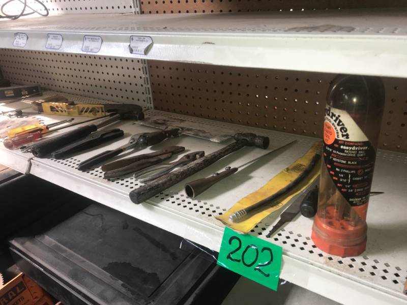 lot 202 image: Shelf of tools, abrasive grinding wheels & cash drawers