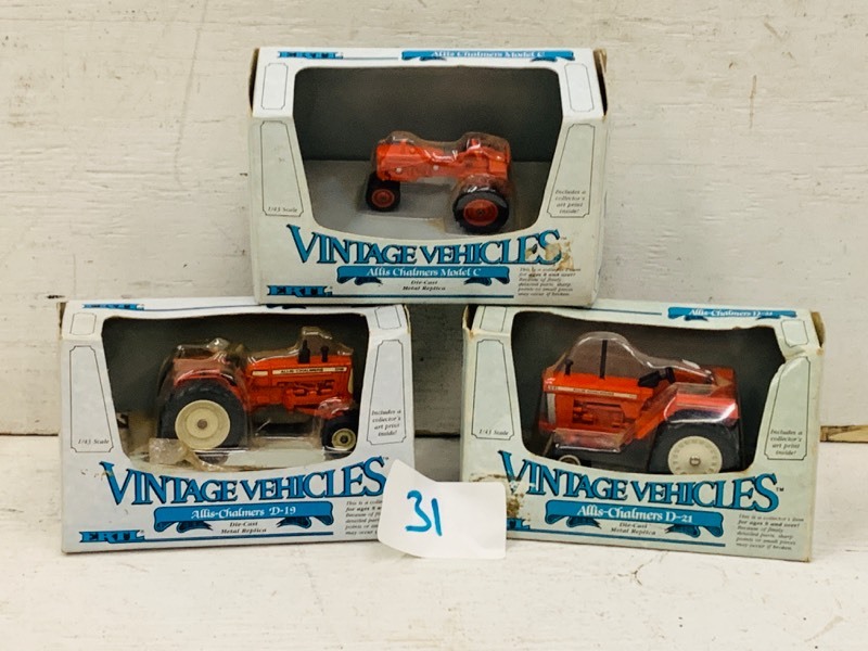 lot 31 image: (3) 143-Scale Die-Cast Tractors