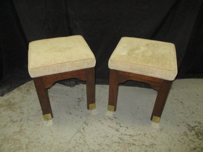 2 stools that can hide under counsil table above