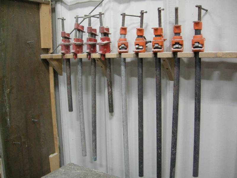 lot 102 image: 9 Pipe Clamps