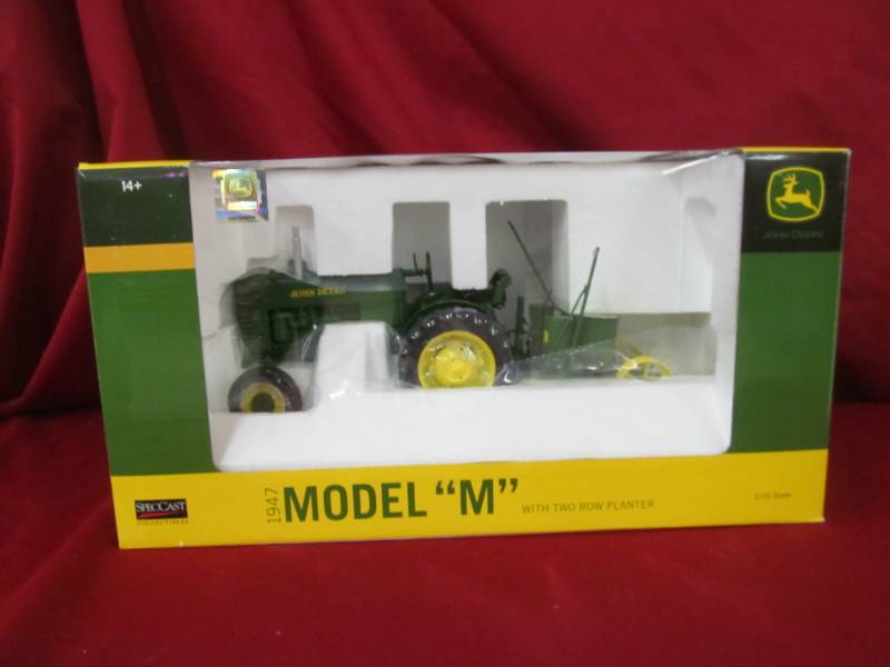lot 16 image: John Deere 1947 ModelM tractor with two row planter