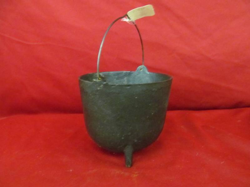lot 70 image: Vintage cast iron pot