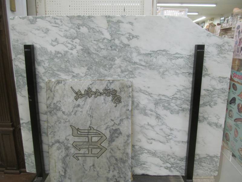 lot 100 image: granite slabs