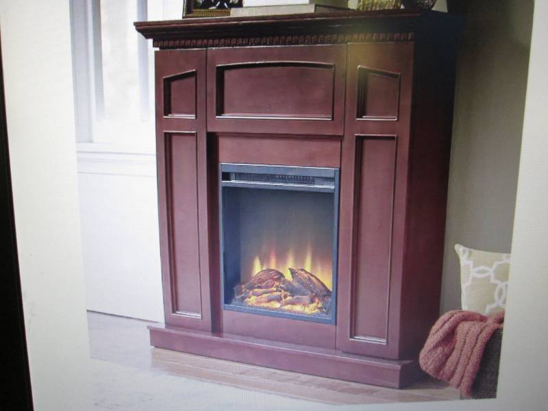 lot 1 image: Electric Storage Fireplace with Cor...