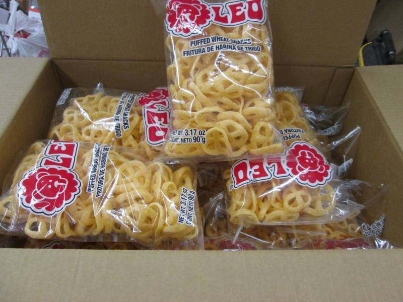 lot 16 image: Case of Leo Puffed Wheat Snacks in ...