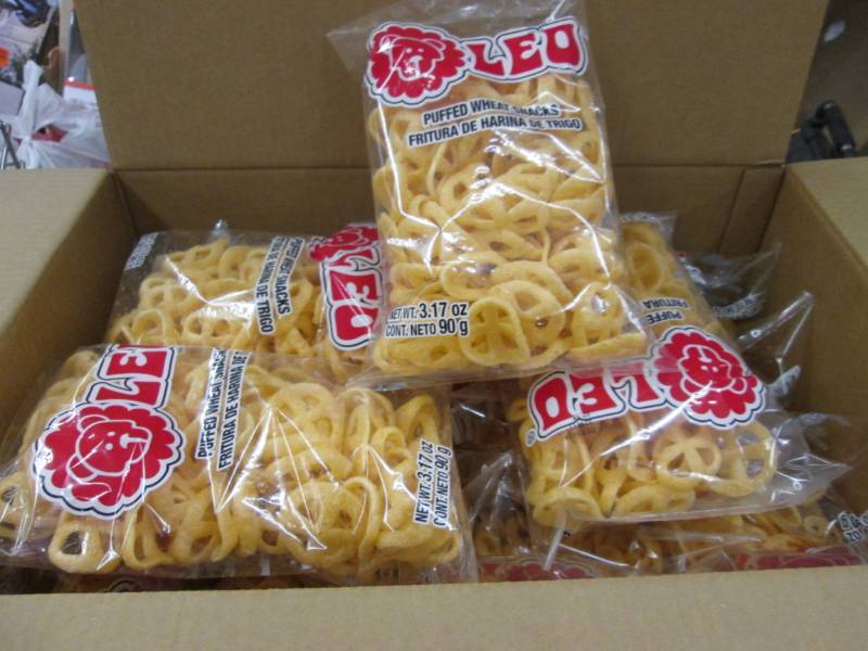 lot 19 image: Case of Leo Puffed Wheat Snacks in ...