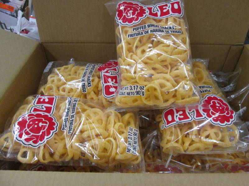 lot 23 image: Case of Leo Puffed Wheat Snacks in ...