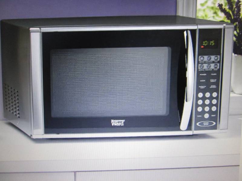 lot 50 image: 1.1 Cu. Ft. Stainless Steel Microwa...
