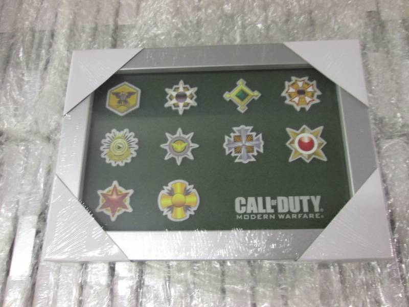 lot 87 image: Case of 40 Call of Duty Photo Metal...