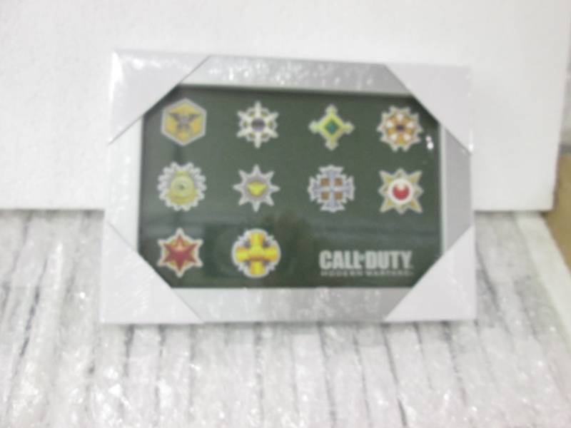 lot 91 image: Case of 40 Call of Duty Photo Metal...