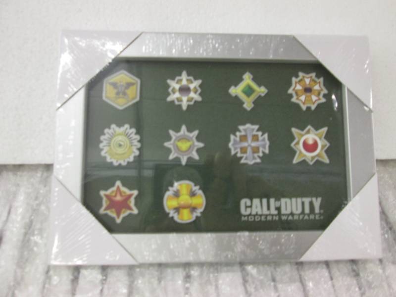 lot 93 image: Case of 40 Call of Duty Photo Metal...