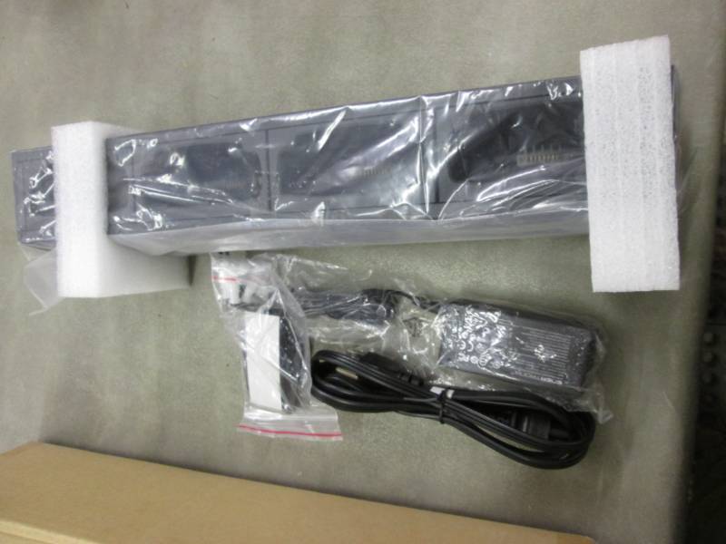 lot 238 image: 4Bay Charger- open box...