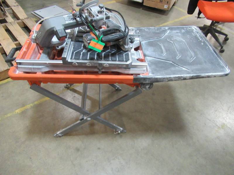 lot 104 image: RIDGID 8 in. Tile Saw with Stand, R4040S - Needs Assembly, Missing Parts.