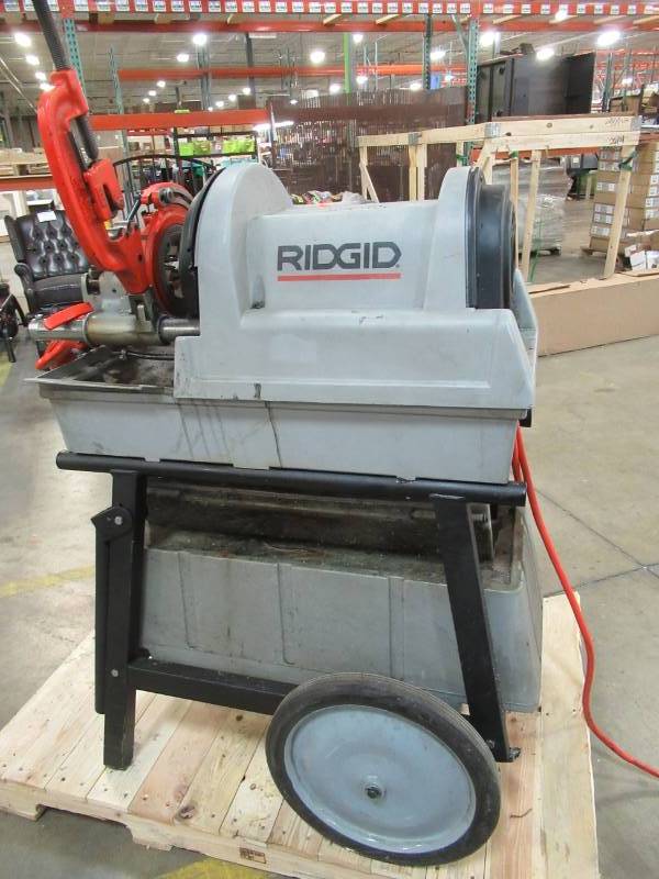 lot 142 image: Ridgid 1822-I Portable Pipe Threader With Dies, Cutter and Tool Box.